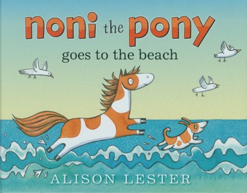 Pony and dog frolicking inthe waves on the cover