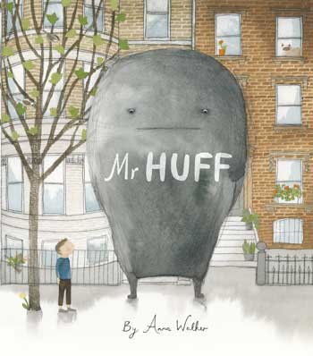 Streetscape with a small boy and a very large Mr Huff